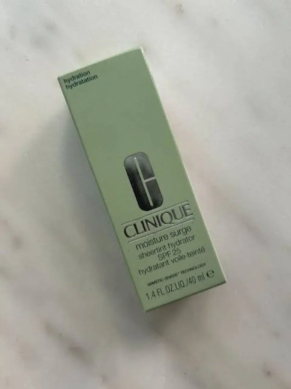 NIB Clinique Moisture Surge Sheertint Hydrator SPF 25 Universal Very Light